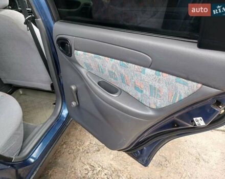 Синий Дэу Ланос, объемом двигателя 1.5 л и пробегом 223 тыс. км за 2199 $, фото 19 на Automoto.ua