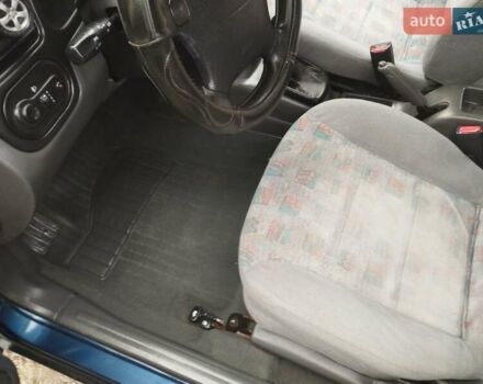 Синий Дэу Ланос, объемом двигателя 1.5 л и пробегом 223 тыс. км за 2199 $, фото 8 на Automoto.ua