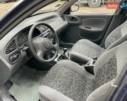 Деу Ланос 2005 у Василькове на Automoto.ua Синій Деу Ланос, об'ємом двигуна 1.5 л та пробігом 140 тис. км за 2650 $, фото 9 на Automoto.ua