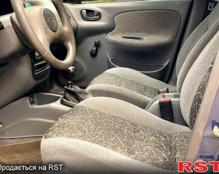 Синий Дэу Ланос, объемом двигателя 1.5 л и пробегом 250 тыс. км за 2100 $, фото 6 на Automoto.ua