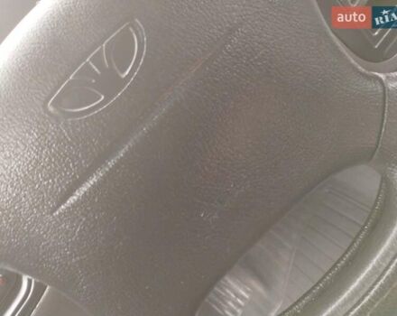 Синий Дэу Ланос, объемом двигателя 1.5 л и пробегом 223 тыс. км за 2199 $, фото 9 на Automoto.ua