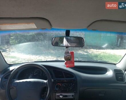 Синий Дэу Ланос, объемом двигателя 1.5 л и пробегом 304 тыс. км за 3500 $, фото 18 на Automoto.ua