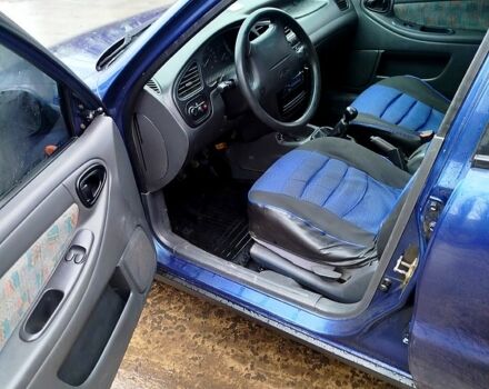 Синій Деу Ланос, об'ємом двигуна 1.5 л та пробігом 256 тис. км за 2350 $, фото 12 на Automoto.ua