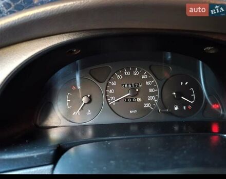 Синий Дэу Ланос, объемом двигателя 1.5 л и пробегом 228 тыс. км за 1650 $, фото 12 на Automoto.ua