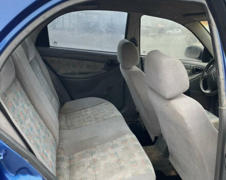 Синий Дэу Ланос, объемом двигателя 1.5 л и пробегом 330 тыс. км за 1399 $, фото 6 на Automoto.ua