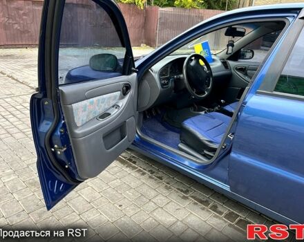 Синий Дэу Ланос, объемом двигателя 1.5 л и пробегом 188 тыс. км за 2850 $, фото 5 на Automoto.ua