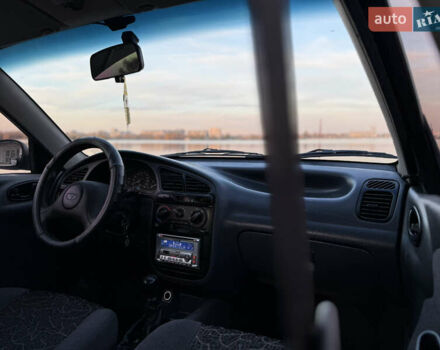 Синій Деу Ланос, об'ємом двигуна 1.5 л та пробігом 201 тис. км за 2850 $, фото 16 на Automoto.ua