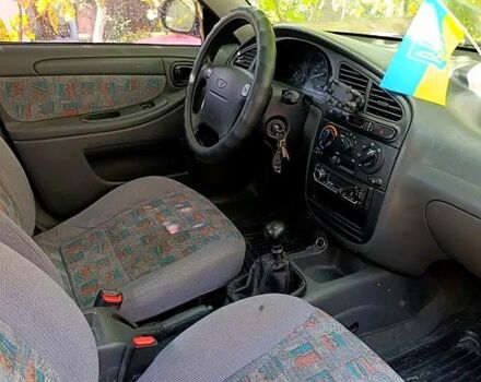 Синий Дэу Ланос, объемом двигателя 1.5 л и пробегом 230 тыс. км за 2600 $, фото 3 на Automoto.ua