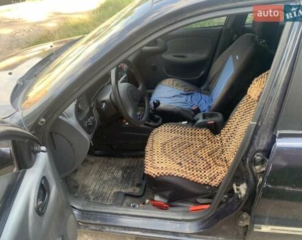 Синій Деу Ланос, об'ємом двигуна 1.5 л та пробігом 240 тис. км за 1500 $, фото 29 на Automoto.ua