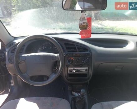Синий Дэу Ланос, объемом двигателя 1.5 л и пробегом 304 тыс. км за 3500 $, фото 15 на Automoto.ua