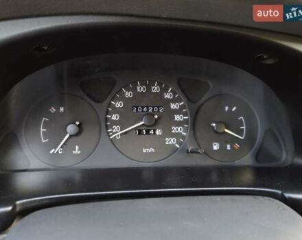 Синій Деу Ланос, об'ємом двигуна 1.5 л та пробігом 204 тис. км за 1950 $, фото 6 на Automoto.ua