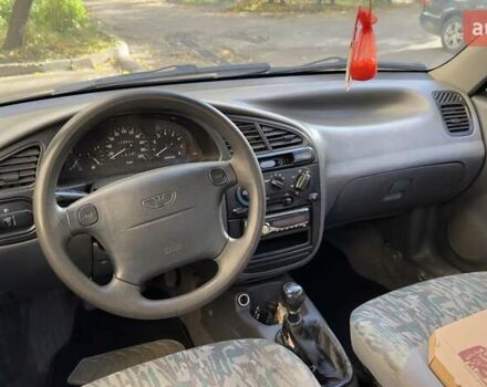 Деу Ланос 2005 у Чернівцях на Automoto.ua Синій Деу Ланос, об'ємом двигуна 1.5 л та пробігом 220 тис. км за 2500 $, фото 6 на Automoto.ua
