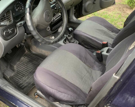 Синий Дэу Ланос, объемом двигателя 1.5 л и пробегом 257 тыс. км за 2000 $, фото 21 на Automoto.ua