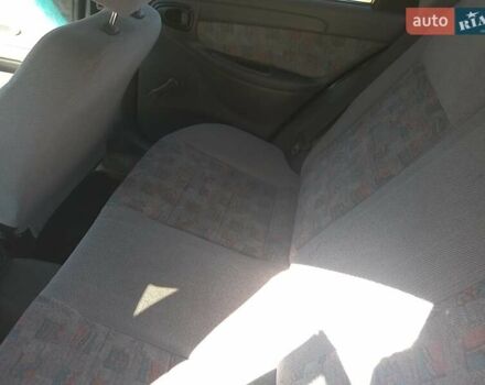 Синий Дэу Ланос, объемом двигателя 1.5 л и пробегом 304 тыс. км за 3500 $, фото 12 на Automoto.ua