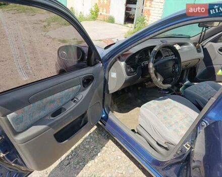 Деу Ланос 2005 у Глухове на Automoto.ua Синій Деу Ланос, об'ємом двигуна 1.5 л та пробігом 251 тис. км за 2900 $, фото 12 на Automoto.ua