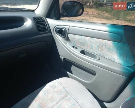 Синий Дэу Ланос, объемом двигателя 1.5 л и пробегом 304 тыс. км за 3500 $, фото 16 на Automoto.ua