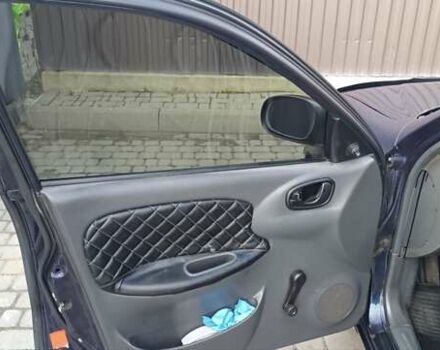 Деу Ланос 2005 у Львові на Automoto.ua Синій Деу Ланос, об'ємом двигуна 1.5 л та пробігом 430 тис. км за 2999 $, фото 11 на Automoto.ua