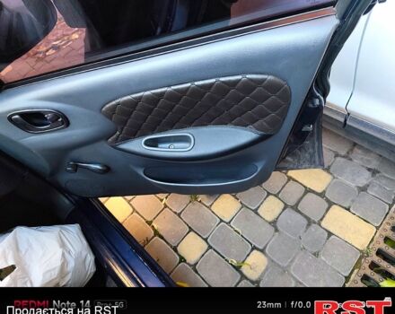 Синий Дэу Ланос, объемом двигателя 1.5 л и пробегом 228 тыс. км за 1650 $, фото 6 на Automoto.ua