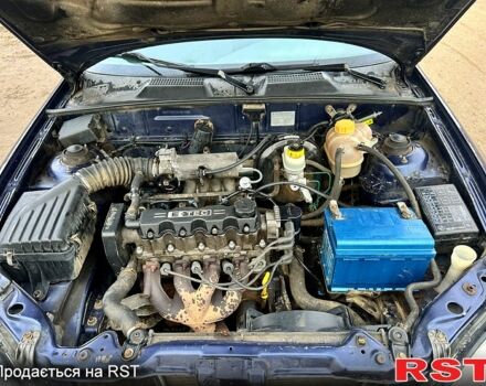 Синій Деу Ланос, об'ємом двигуна 1.5 л та пробігом 224 тис. км за 1300 $, фото 8 на Automoto.ua