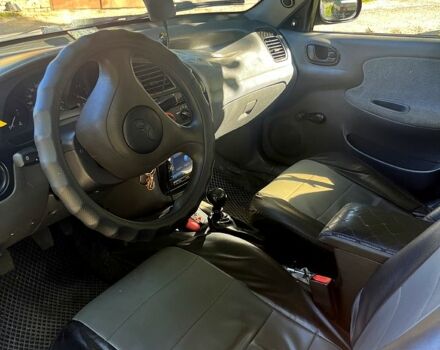 Синий Дэу Ланос, объемом двигателя 1.5 л и пробегом 190 тыс. км за 1640 $, фото 7 на Automoto.ua