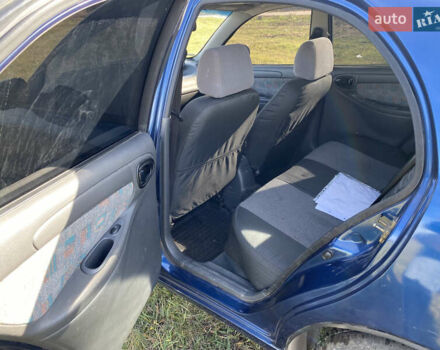 Деу Ланос 2005 у Полтаві на Automoto.ua Синій Деу Ланос, об'ємом двигуна 1.6 л та пробігом 2 тис. км за 2800 $, фото 8 на Automoto.ua
