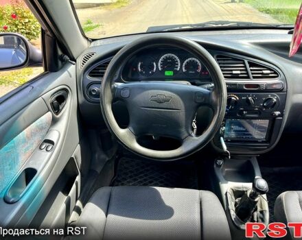 Синий Дэу Ланос, объемом двигателя 1.5 л и пробегом 200 тыс. км за 2350 $, фото 5 на Automoto.ua