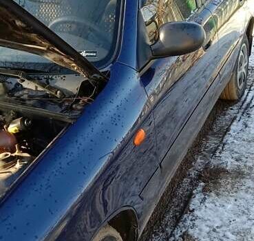 Синій Деу Ланос, об'ємом двигуна 1.3 л та пробігом 150 тис. км за 2500 $, фото 7 на Automoto.ua