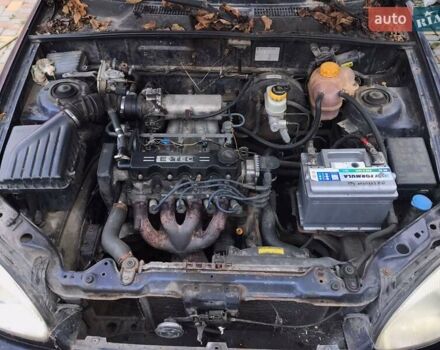 Синий Дэу Ланос, объемом двигателя 1.5 л и пробегом 345 тыс. км за 1550 $, фото 4 на Automoto.ua