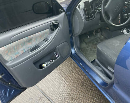 Синий Дэу Ланос, объемом двигателя 1.5 л и пробегом 287 тыс. км за 2500 $, фото 12 на Automoto.ua