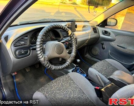 Синій Деу Ланос, об'ємом двигуна 1.5 л та пробігом 300 тис. км за 1999 $, фото 11 на Automoto.ua