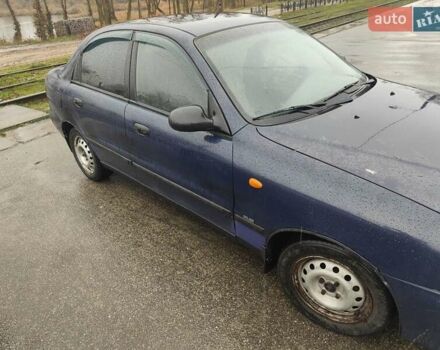 Синий Дэу Ланос, объемом двигателя 1.5 л и пробегом 200 тыс. км за 1600 $, фото 2 на Automoto.ua