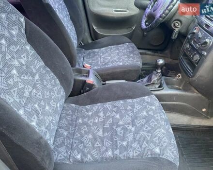 Синий Дэу Ланос, объемом двигателя 1.5 л и пробегом 212 тыс. км за 2350 $, фото 12 на Automoto.ua