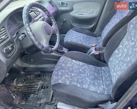 Синий Дэу Ланос, объемом двигателя 1.5 л и пробегом 212 тыс. км за 2350 $, фото 14 на Automoto.ua