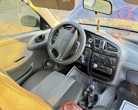 Синий Дэу Ланос, объемом двигателя 1.6 л и пробегом 197 тыс. км за 3000 $, фото 4 на Automoto.ua