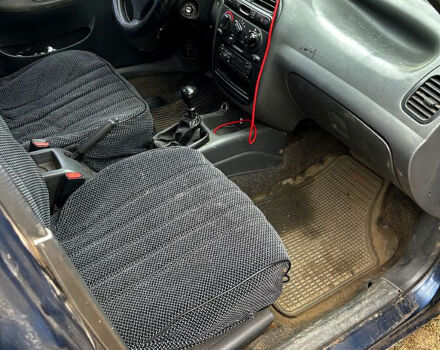 Синий Дэу Ланос, объемом двигателя 1.6 л и пробегом 283 тыс. км за 1000 $, фото 4 на Automoto.ua