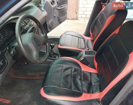 Деу Ланос 2006 у Харкові на Automoto.ua Синій Деу Ланос, об'ємом двигуна 1.5 л та пробігом 173 тис. км за 2790 $, фото 24 на Automoto.ua