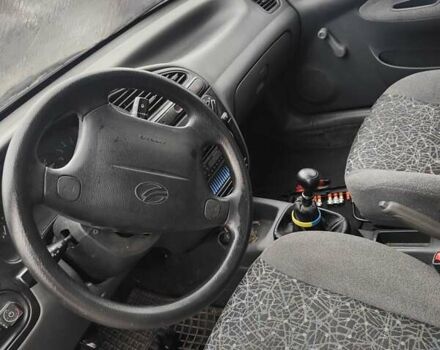 Синий Дэу Ланос, объемом двигателя 1.5 л и пробегом 200 тыс. км за 1600 $, фото 6 на Automoto.ua