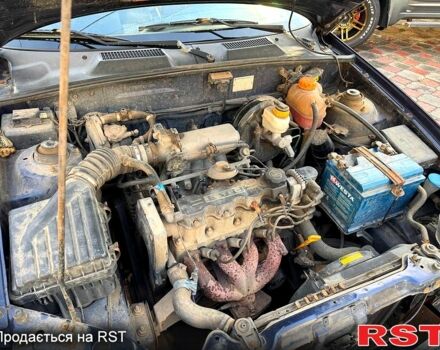 Синій Деу Ланос, об'ємом двигуна 1.5 л та пробігом 300 тис. км за 1999 $, фото 13 на Automoto.ua