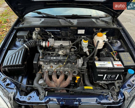 Синий Дэу Ланос, объемом двигателя 1.45 л и пробегом 211 тыс. км за 2600 $, фото 14 на Automoto.ua