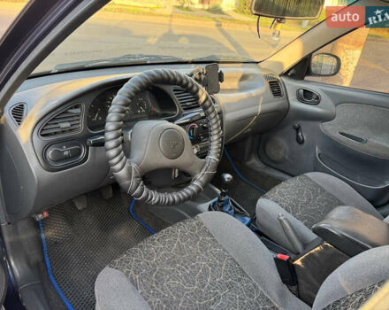 Синій Деу Ланос, об'ємом двигуна 1.5 л та пробігом 300 тис. км за 1999 $, фото 12 на Automoto.ua