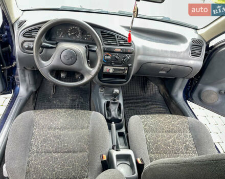 Синий Дэу Ланос, объемом двигателя 1.5 л и пробегом 208 тыс. км за 2200 $, фото 12 на Automoto.ua