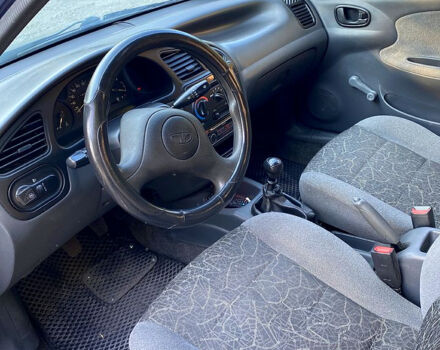 Синий Дэу Ланос, объемом двигателя 1.5 л и пробегом 120 тыс. км за 1900 $, фото 8 на Automoto.ua