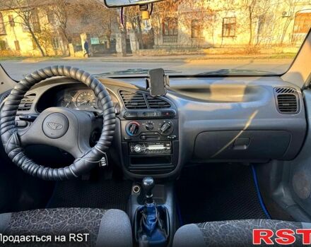 Синій Деу Ланос, об'ємом двигуна 1.5 л та пробігом 300 тис. км за 1999 $, фото 12 на Automoto.ua