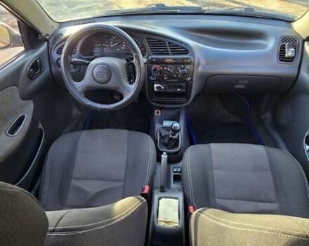 Синий Дэу Ланос, объемом двигателя 1.5 л и пробегом 345 тыс. км за 1800 $, фото 3 на Automoto.ua