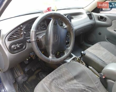 Синій Деу Ланос, об'ємом двигуна 1.5 л та пробігом 301 тис. км за 2650 $, фото 4 на Automoto.ua