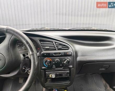 Синий Дэу Ланос, объемом двигателя 1.5 л и пробегом 450 тыс. км за 2850 $, фото 7 на Automoto.ua