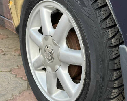 Синій Деу Ланос, об'ємом двигуна 1.5 л та пробігом 300 тис. км за 1999 $, фото 14 на Automoto.ua