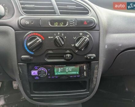 Синий Дэу Ланос, объемом двигателя 1.5 л и пробегом 172 тыс. км за 1450 $, фото 10 на Automoto.ua