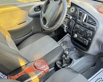 Синий Дэу Ланос, объемом двигателя 1.6 л и пробегом 197 тыс. км за 3000 $, фото 7 на Automoto.ua