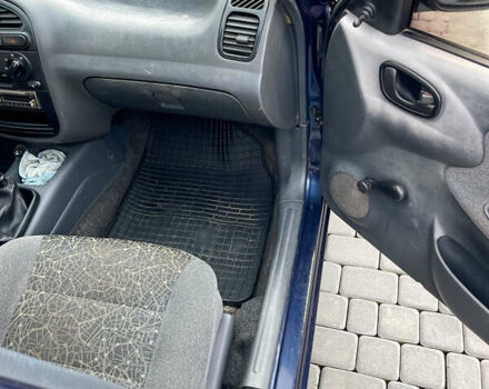 Синий Дэу Ланос, объемом двигателя 1.5 л и пробегом 208 тыс. км за 2200 $, фото 10 на Automoto.ua